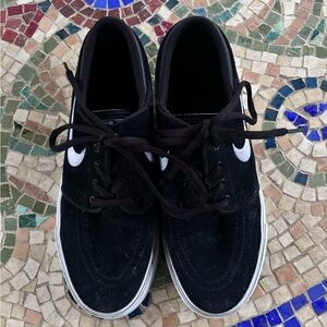 Black and White Nike Suede Sneakers